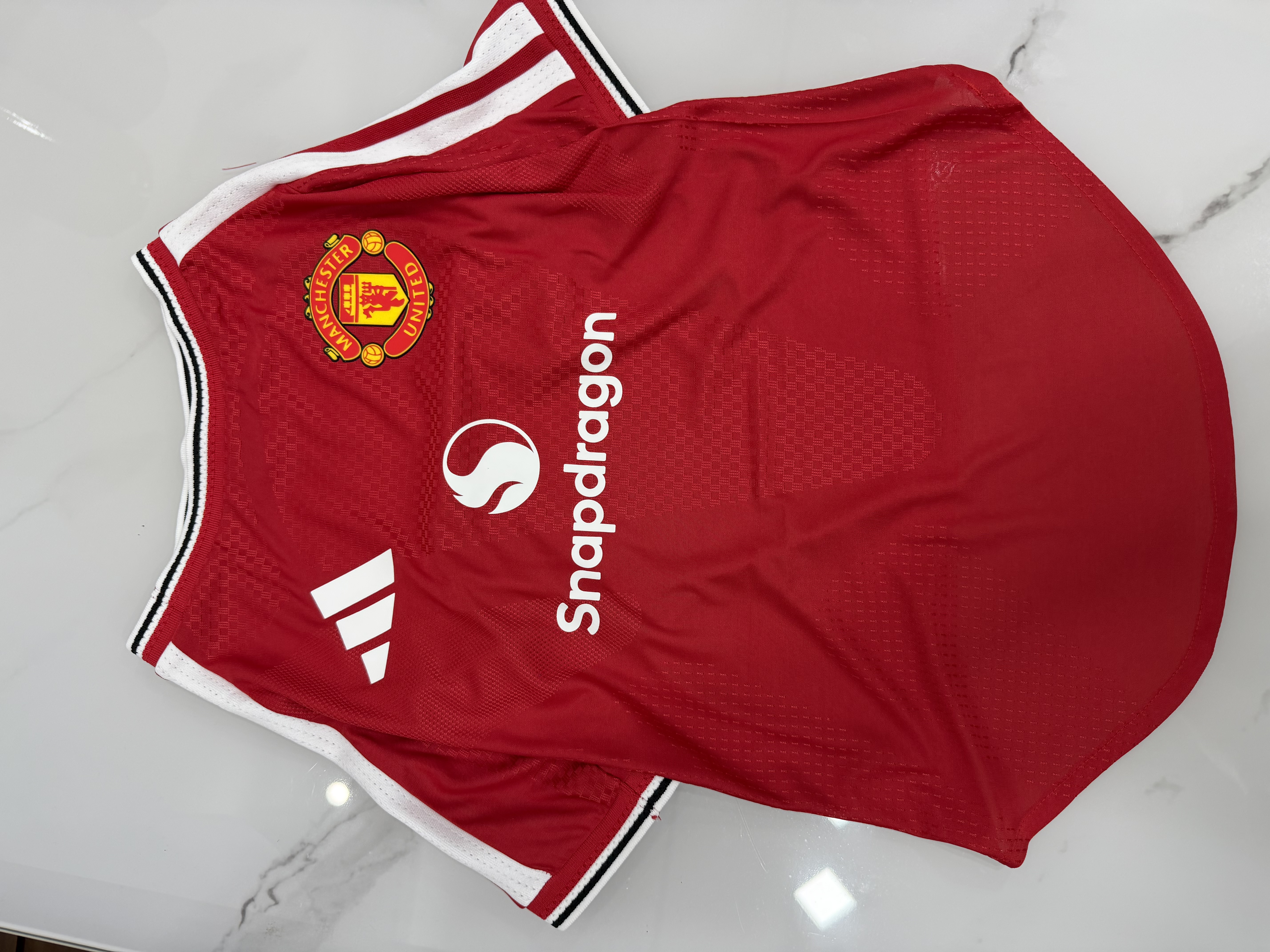 Manchester United 26/27 home pet